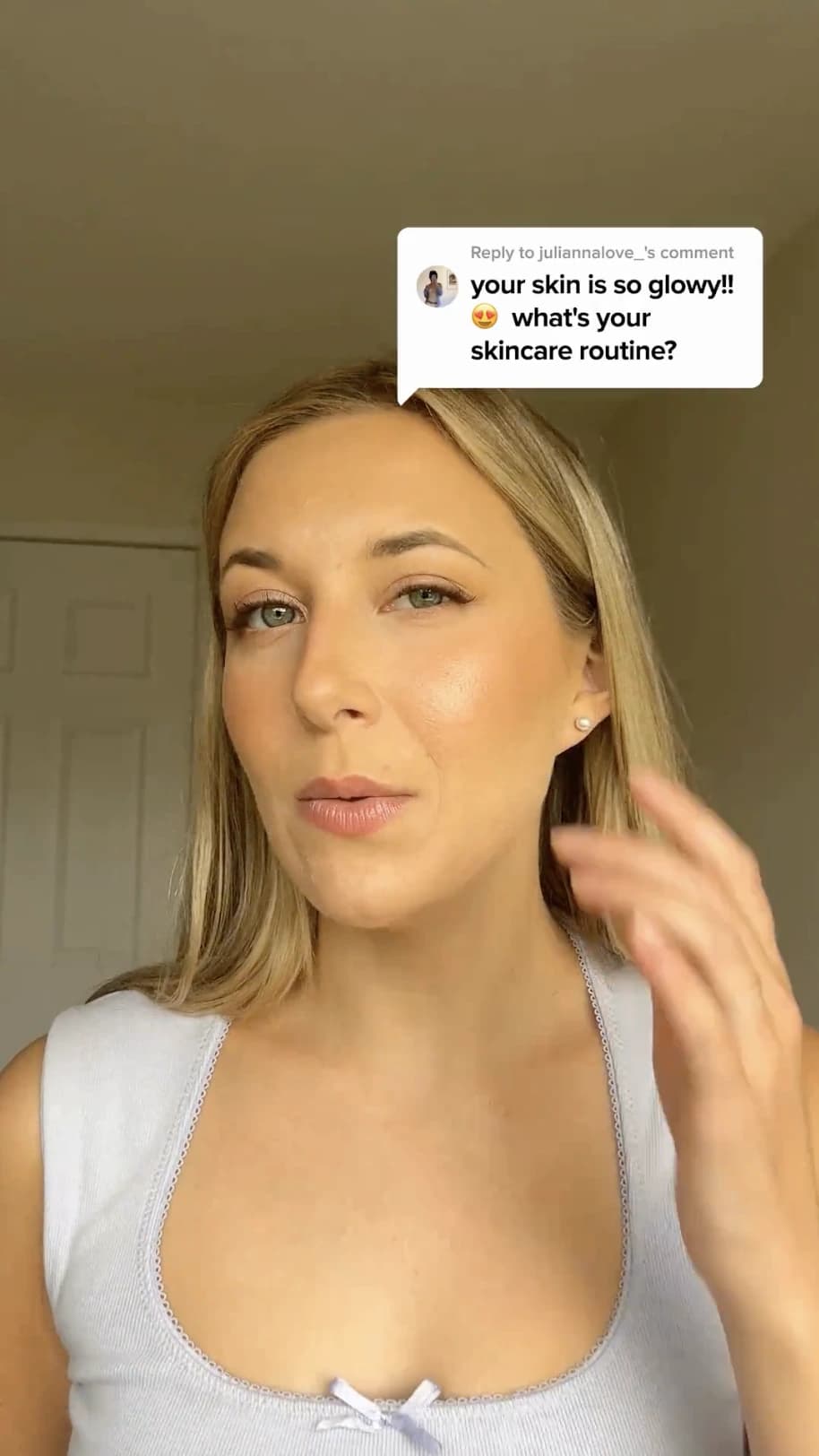 UGC creator filming a talking-to-camera reply to a viewer question about her skincare routine